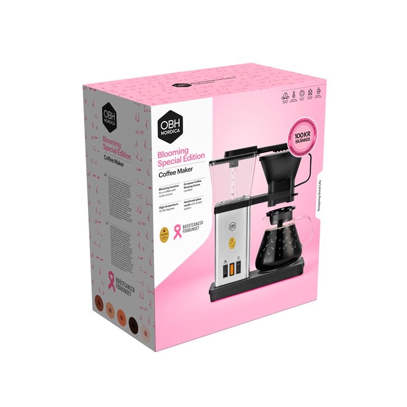 Vinn en kaffemaskin med rosa bandet-motiv hos Opus Bilprovning